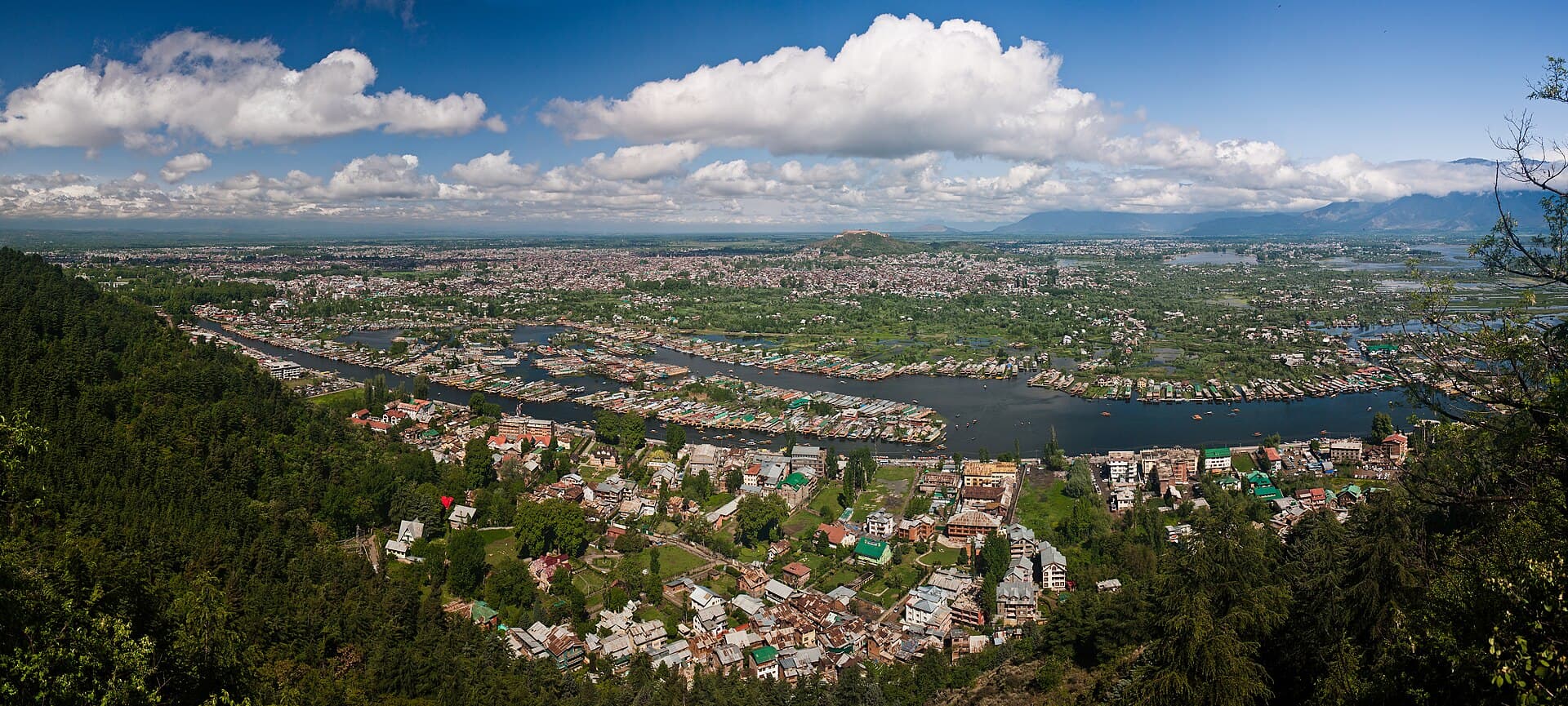 Panoramic real photograph of Srinagar, Dal Lake, and the Himalayan mountains in Jammu & Kashmir
